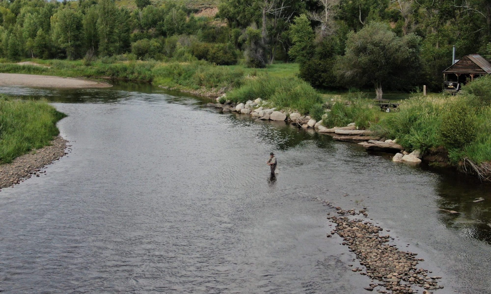 An angler fishes in the Elk River east of Steamboat Springs, Colorado